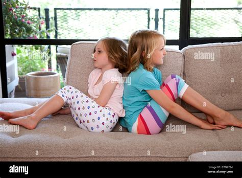 two girls on couch Search